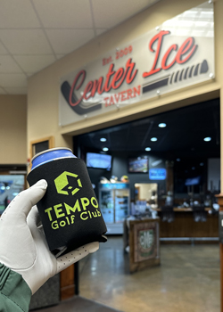 Tempo Golf Club koozie next to the Center Ice Tavern sign